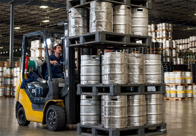 Forklift carrying kegs