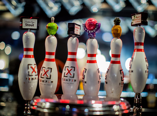 tap handle line-up of Ten Pin Brewing beers on tap