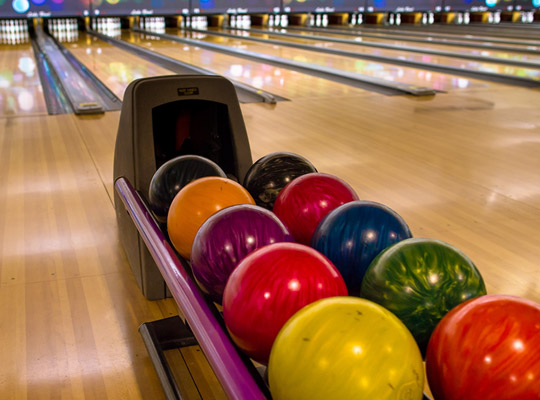 Bowling balls on a ball return